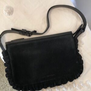 VIA SPIGA black suede shoulder handbag. Leather weaved through perimeter of bag.